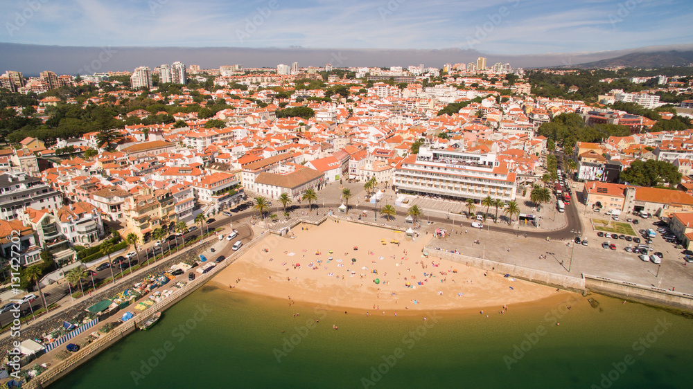 People relax on the beautiful beaches of Cascais Portugal aerial view