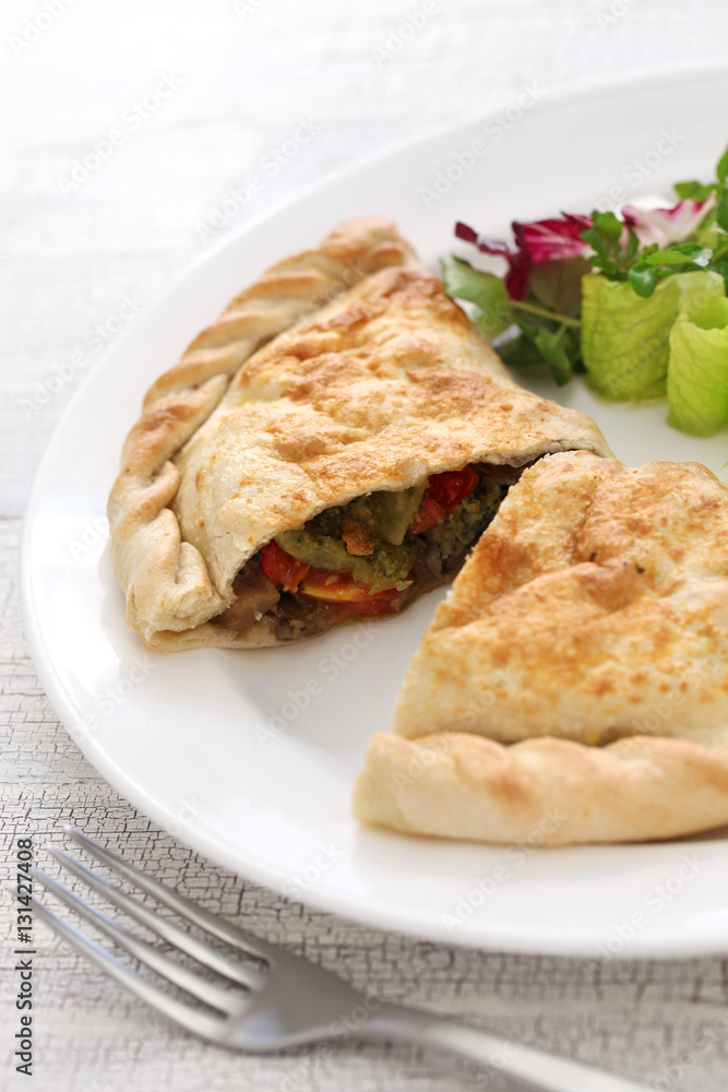 calzone, folded stuffed pizza, italian food calzone, folded stuffed pizza, italian food