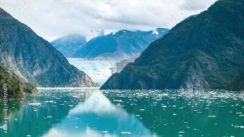 Ship Cruising Towards Sawyer Glacier at the End of Tracy Arm Fjord Alaska on a Tranquil Summer Day