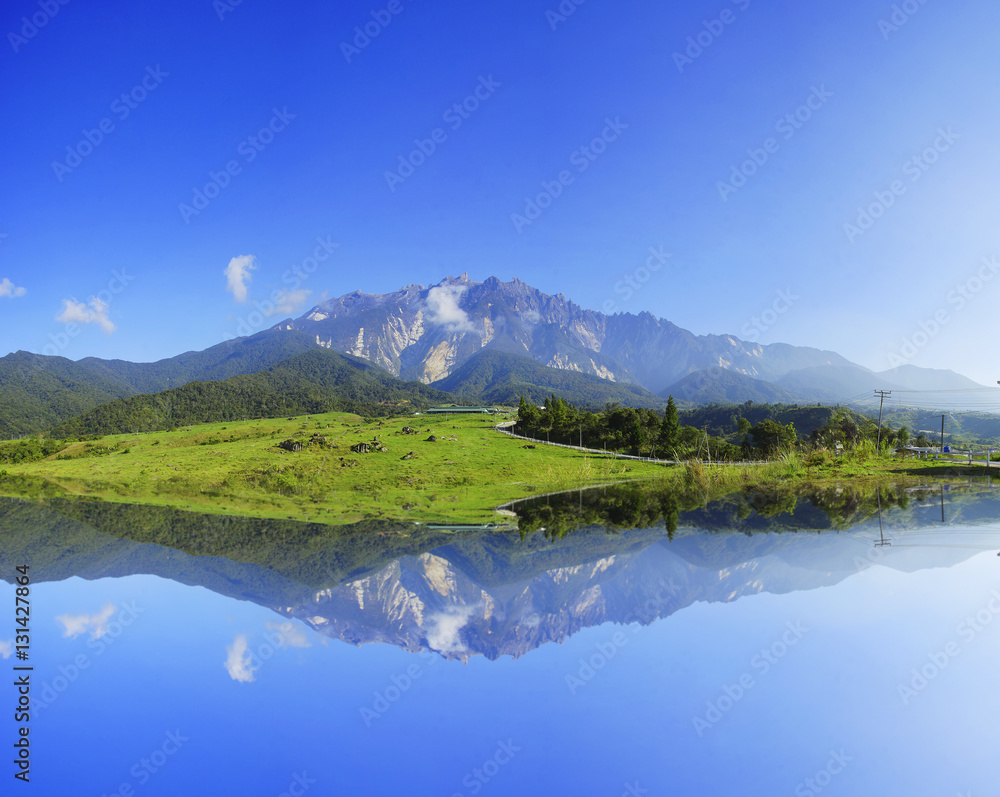 Fototapeta premium Reflection Beautiful View of Mount Kinabalu During Blue Sky.
