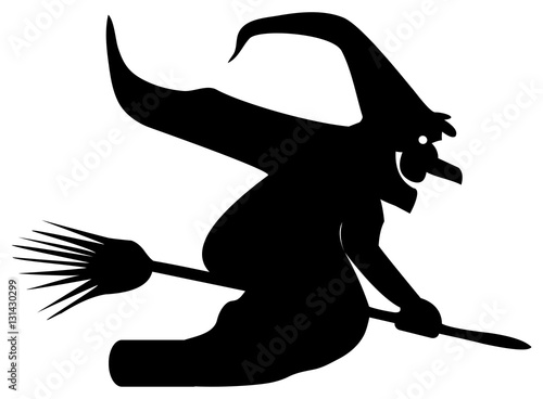 Silhouette of a witch on a broomstick