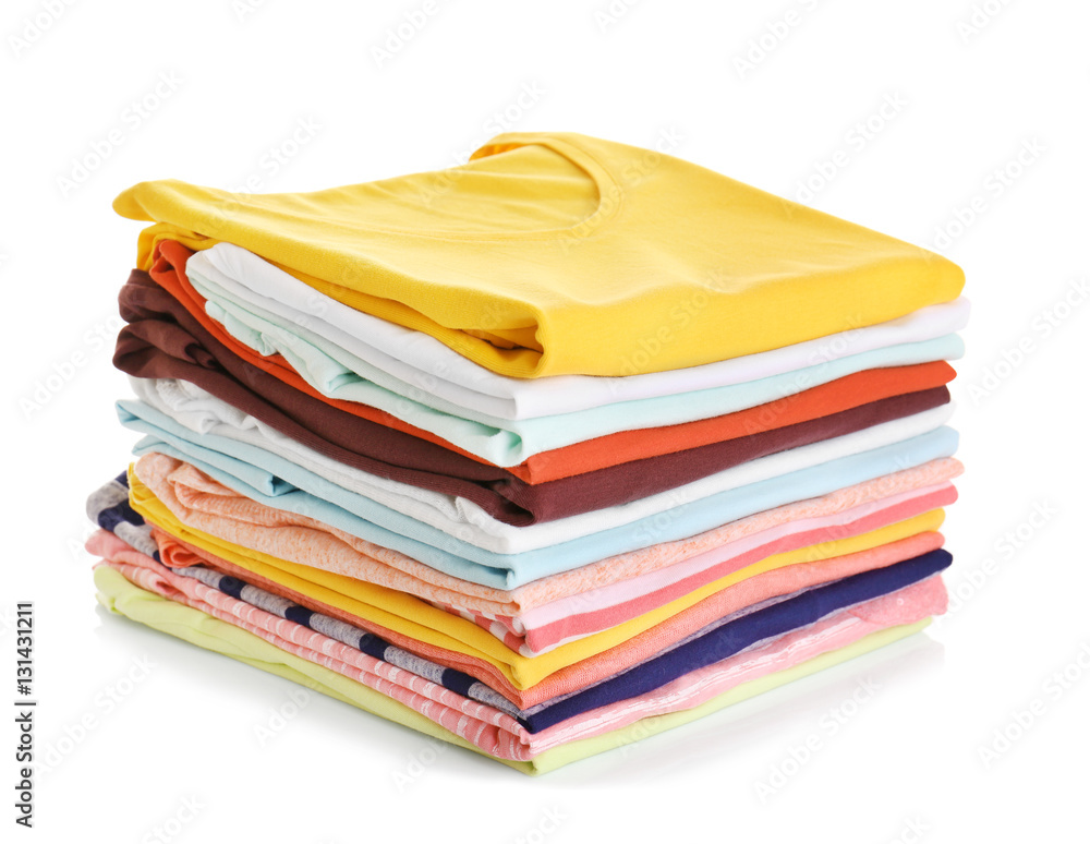 Stack of colorful clothes on white background, closeup Stack of colorful clothes on white background, closeup