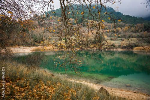 Autumn landscape with green waters of lake Tsivlos, Peloponnese, photo