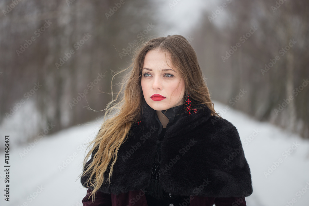 Winter portrait of a girl with long hair Winter portrait of a girl with long hair