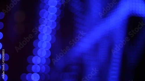 Universe colorful moving bokeh unfocused lights in club