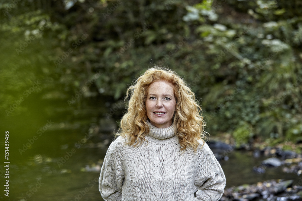Portrait of smiling woman in the nature Portrait of smiling woman in the nature