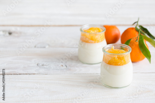 Bild auf Leinwand Home made panna cotta with mandarin jam