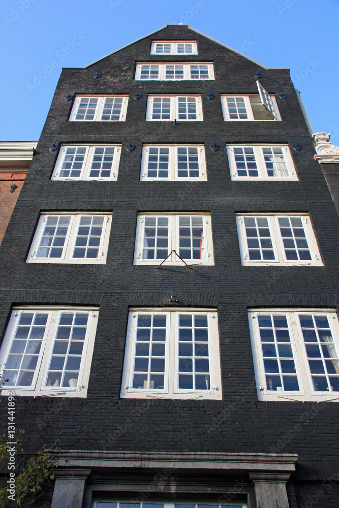 Fototapeta premium Maison à pignon en briques à Amsterdam, Pays-Bas