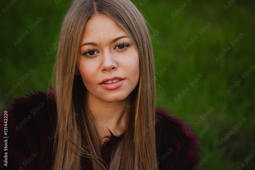 Obraz premium Beautiful portrait of a blonde girl