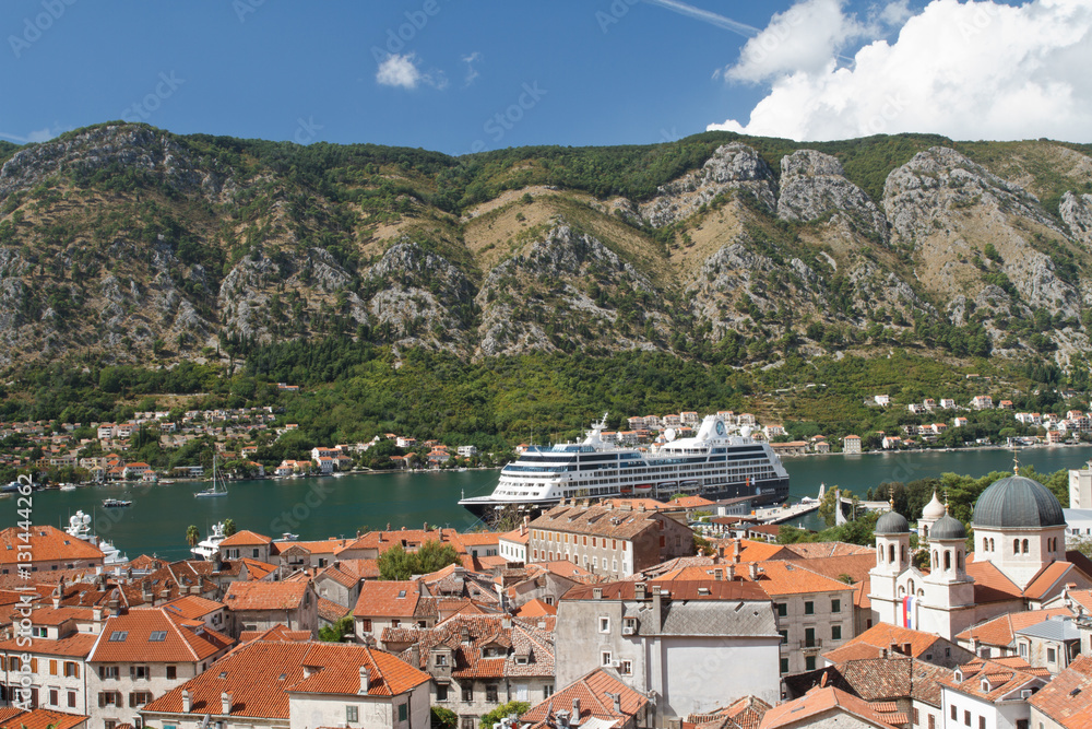 Top view of the city of Kotor bay and a cruise ship. Montenegro, Kotor