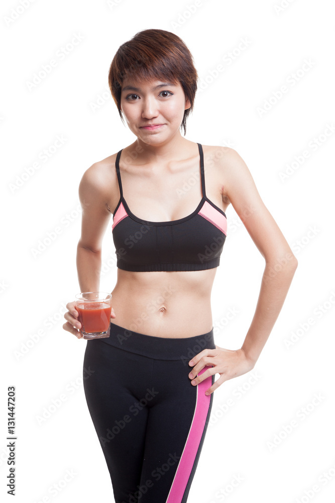 Beautiful healthy Asian girl with tomato juice. Beautiful healthy Asian girl with tomato juice.