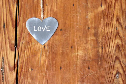 heart with love on wooden background with copy space