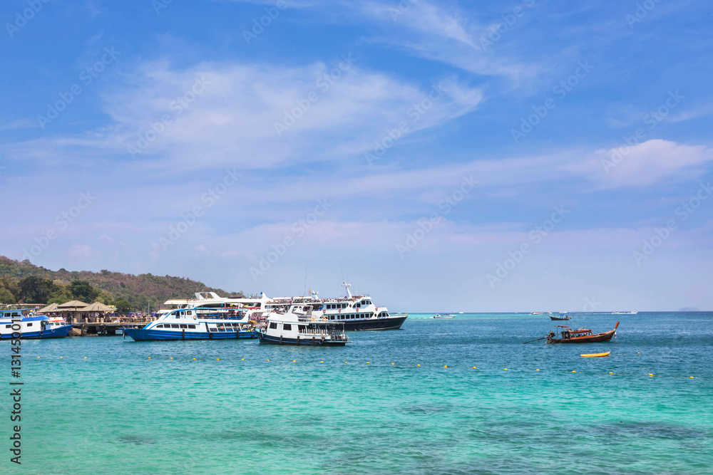 Cruising ships and boats moored in andaman sea at Phi Phi Don island , Thailand Cruising ships and boats moored in andaman sea at Phi Phi Don island , Thailand