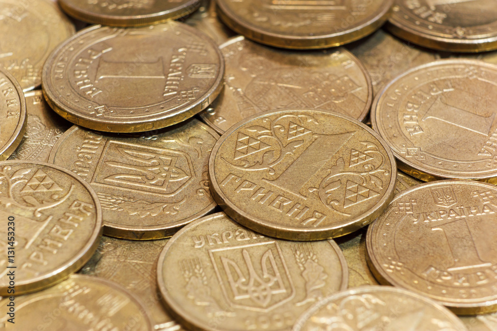 Side closeup of Ukrainian metallic coins hrivnya Side closeup of Ukrainian metallic coins hrivnya