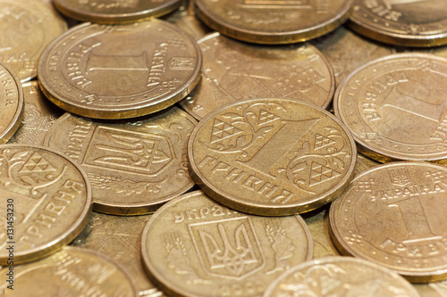 Side closeup of Ukrainian metallic coins hrivnya
