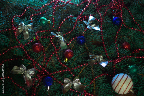 Bows, Beads, balls on the Christmas tree branches