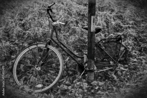 Broken bicycle in abandoned kindergarten