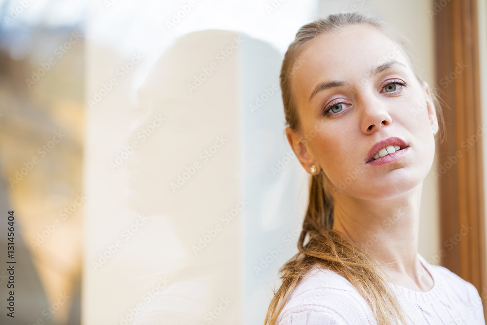 Obraz premium Portrait close up of young beautiful woman