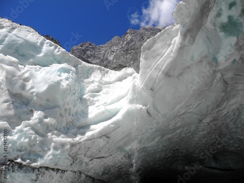 Gletschertor Eiskapelle bei St. Bartholomä am Königsee mit Watzmann-Ostwand im Winter, Bayern, Deutschland photo