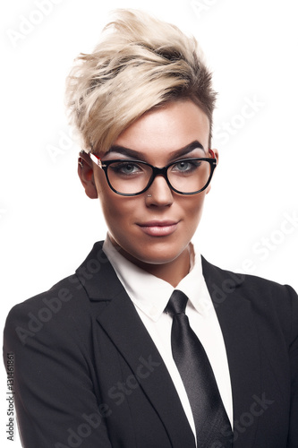 Blond beautiful business lady in black suit