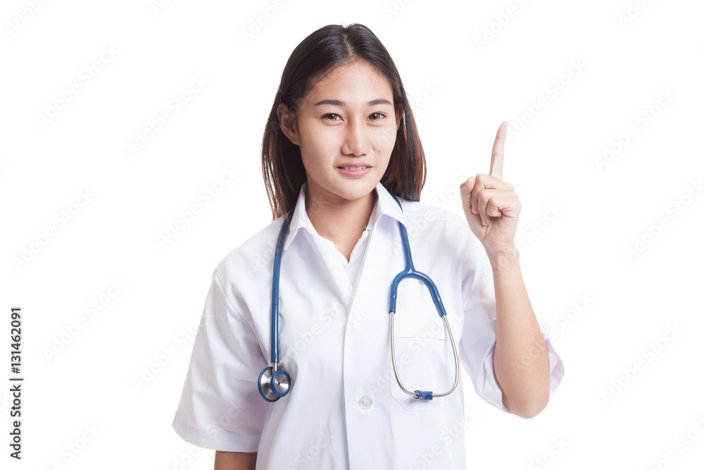 Asian young female doctor point up. Asian young female doctor point up.
