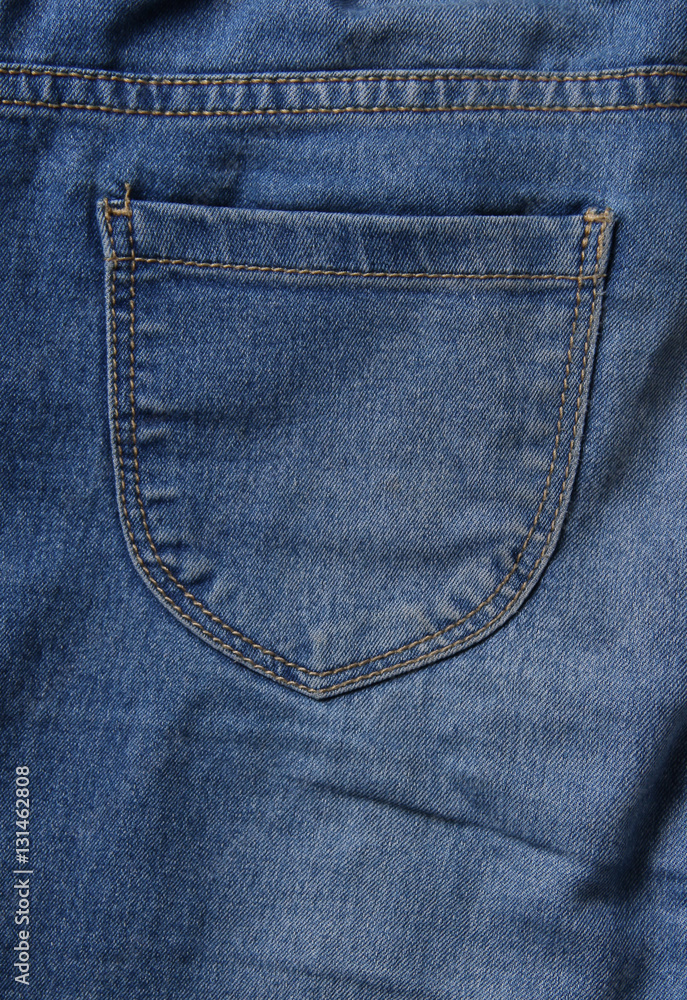 Back pocket of blue jeans Back pocket of blue jeans