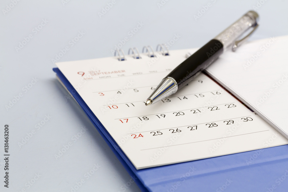 Planning calendar on the office desk. Planning calendar on the office desk.