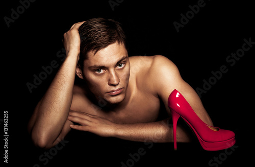Photography Portrait of a naked guy on  black background
