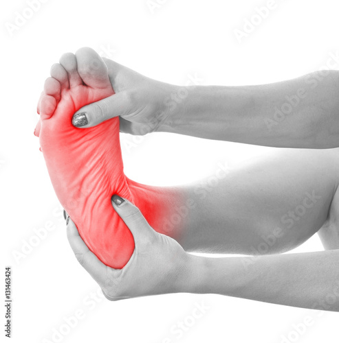 Pain in the foot. Massage of female feet.