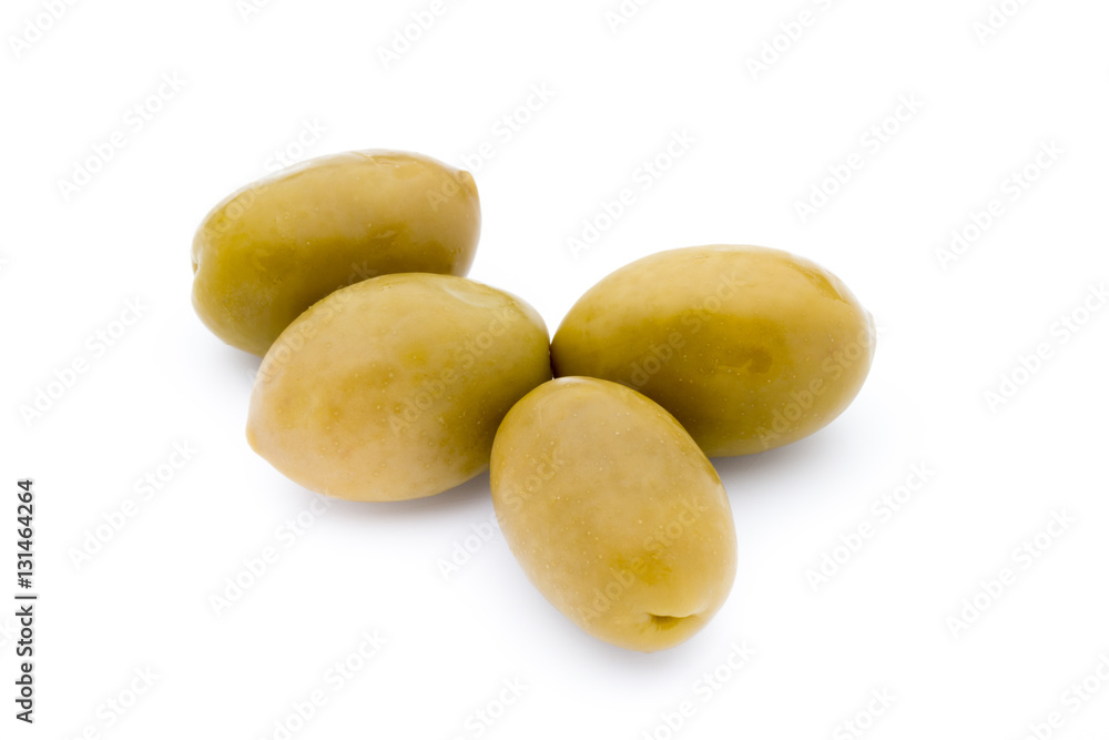 Green big olives on the white background. Green big olives on the white background.