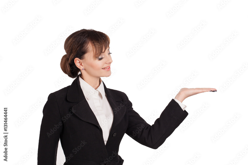 Beautiful woman in a business suit holding something on the palm. Isolated on white. Beautiful woman in a business suit holding something on the palm. Isolated on white.