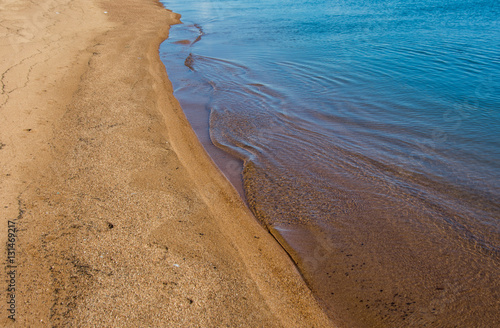 water splashes along the shore photo