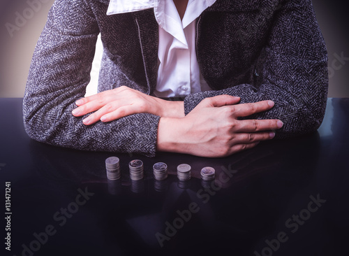 Close-up Of Businesswoman with Coins