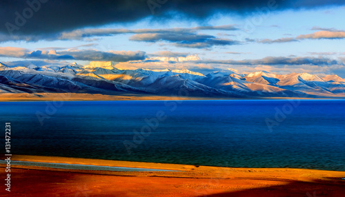 Snow covered mountain and Nam lake at sunrise, Tibet, China