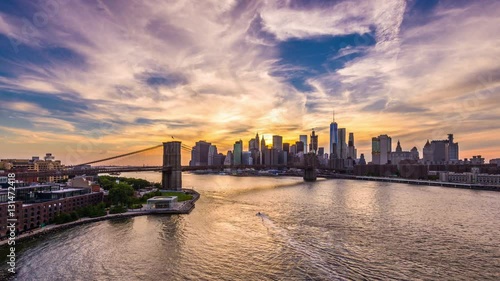 New York City time lapse from above the East River from day to night. photo