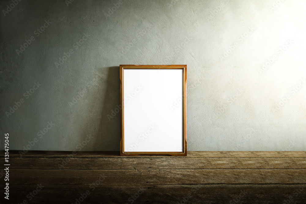 photo frame on wooden table over grunge background photo frame on wooden table over grunge background