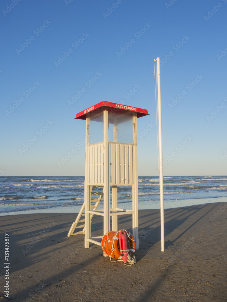 Lifeguard tower at beach. The word 