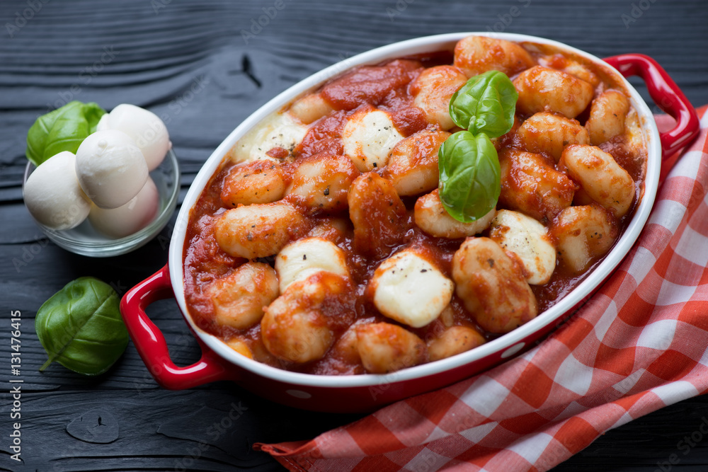 Casserole with italian gnocchi alla Sorrentina, close-up Casserole with italian gnocchi alla Sorrentina, close-up