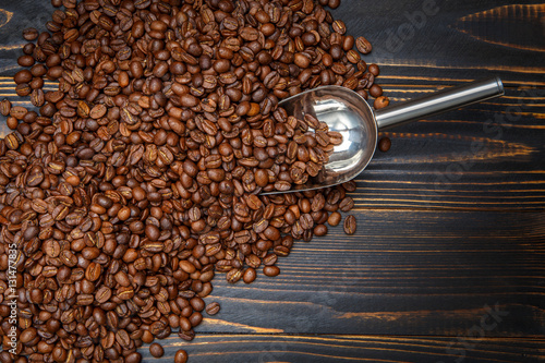 roasted coffee beans on wooden background