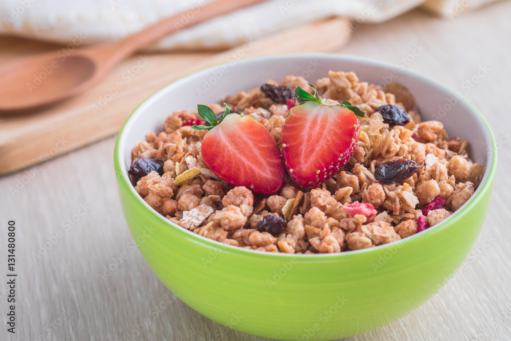 Muesli with strawberry in bowl for healthy breakfast Muesli with strawberry in bowl for healthy breakfast