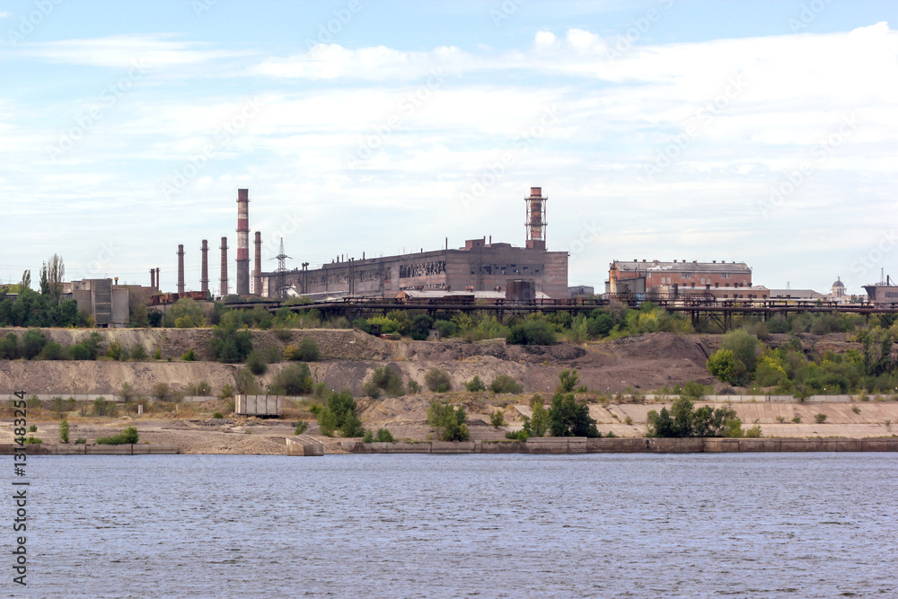 Panoramic view of ironworks on river coastline Panoramic view of ironworks on river coastline