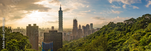 ​
Cityscape nightlife view of Taipei. Taiwan city skyline at twilight time,  The seaside mountain town scenery in Jiufen, with Taipei 101 Tower in Xinyi Commercial District  photo