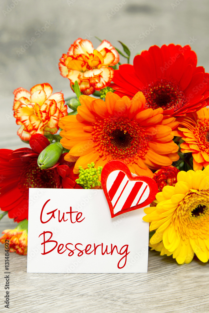 Blumen und Karte: Gute Besserung Stock Photo | Adobe Stock