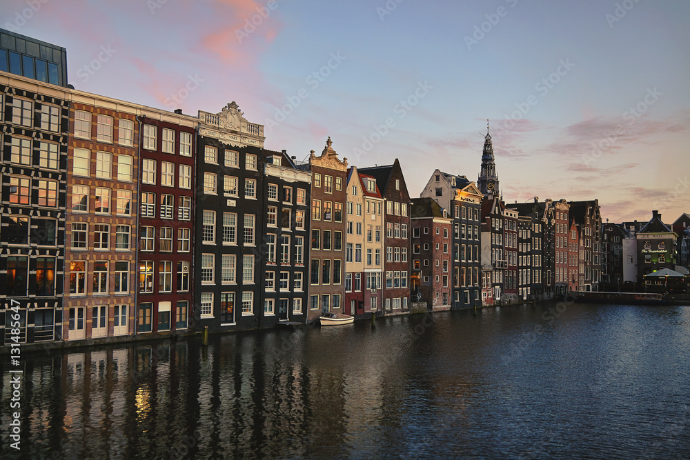 Amsterdam medival residence buildings on the water on beautiful