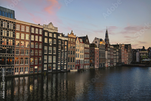 Amsterdam medival residence buildings on the water on beautiful
