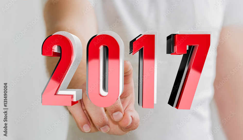 Businessman touching 2017 3D rendering text Businessman touching 2017 3D rendering text