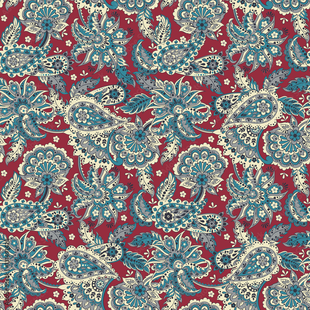 Paisley seamless pattern with flowers in indian style. Floral vector background