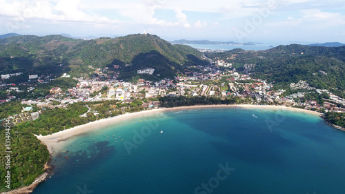 Aerial view of boats on the sea near Kata Beach with Big Buddha statue in background, Phuket, Thailand