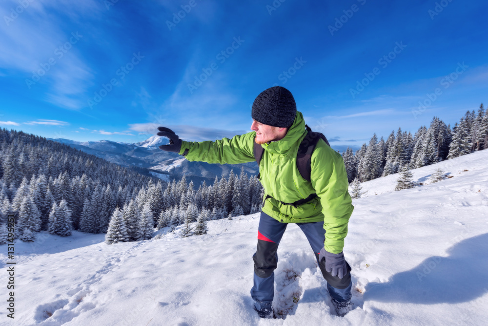 Tourist fun in winter mountains