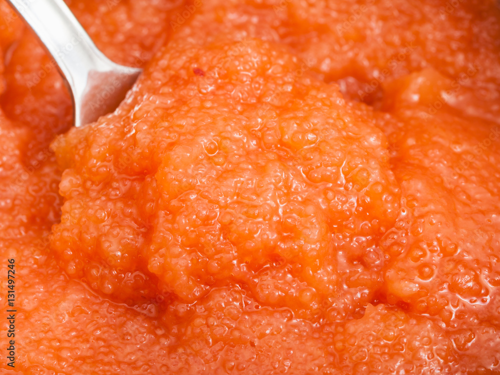 surface of salty caviar of whitefish with spoon surface of salty caviar of whitefish with spoon